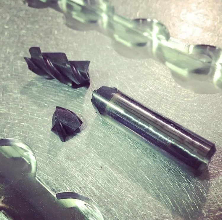 broken end mill in two pieces from excessive tool wear