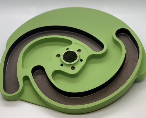 green machined part from Tomi Engineering INC