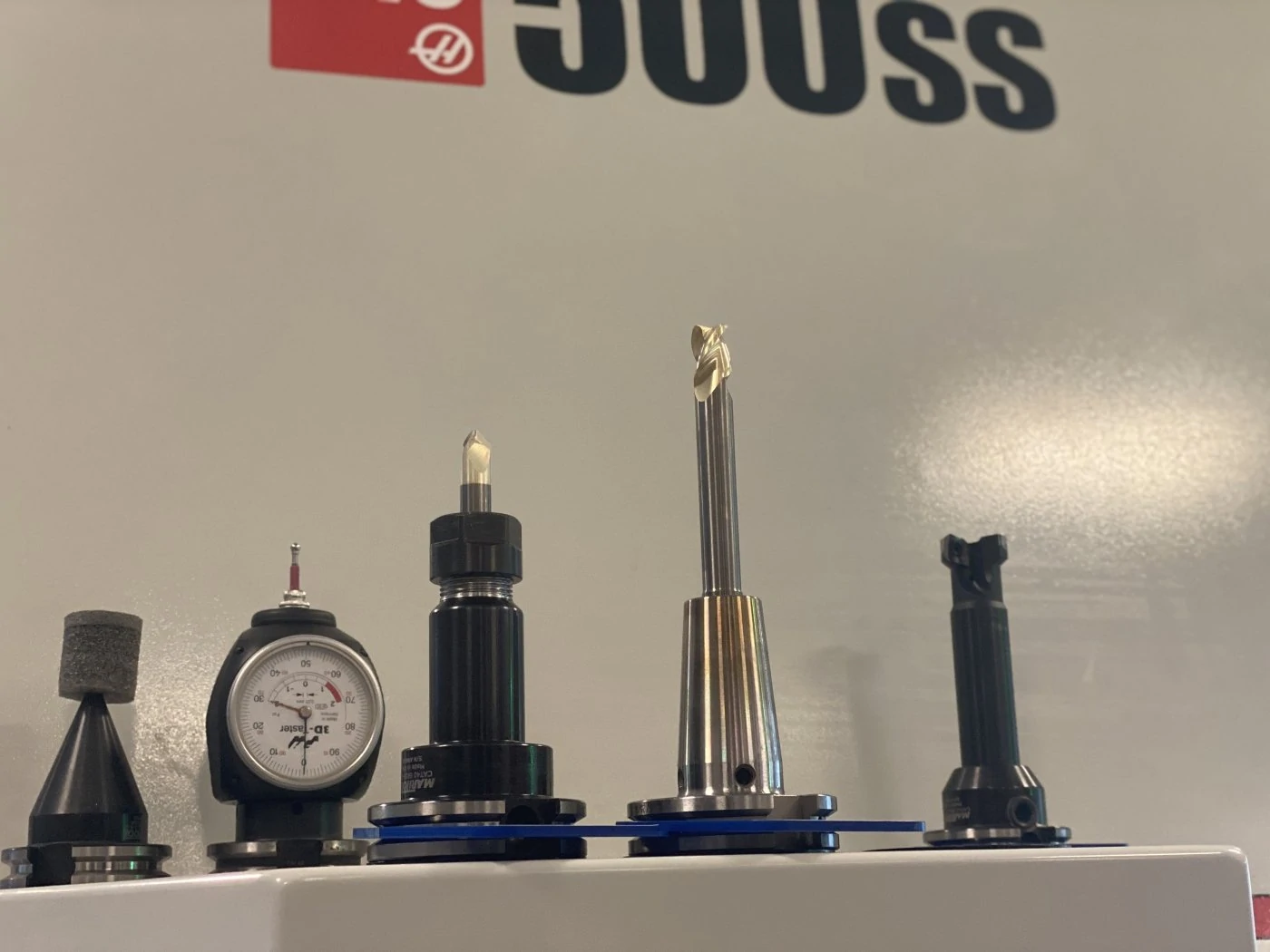 Assortment of end mills and tool holders at Rennscott LLC