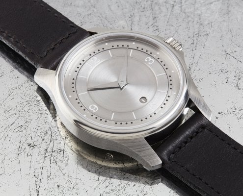 Schon DSGN silver wrist watch with black band