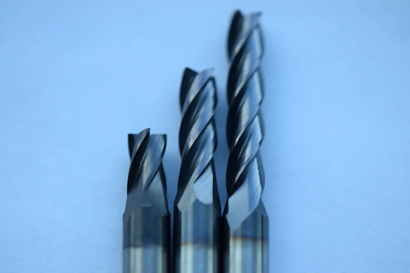 Three Harvey tool AlTiN coated end mills