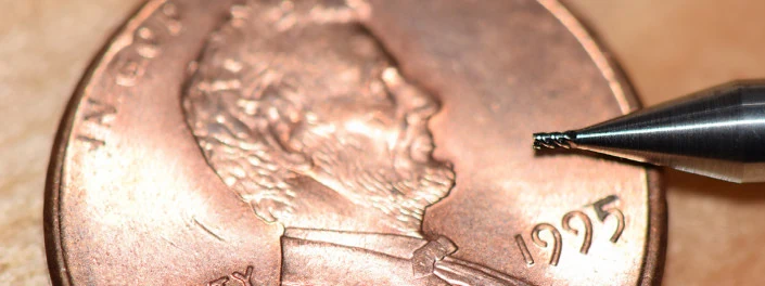 Miniature Tooling Running Parameters – Featured Image Miniature tool on penny